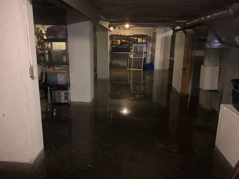 A basement backed up with sewage and water damage.